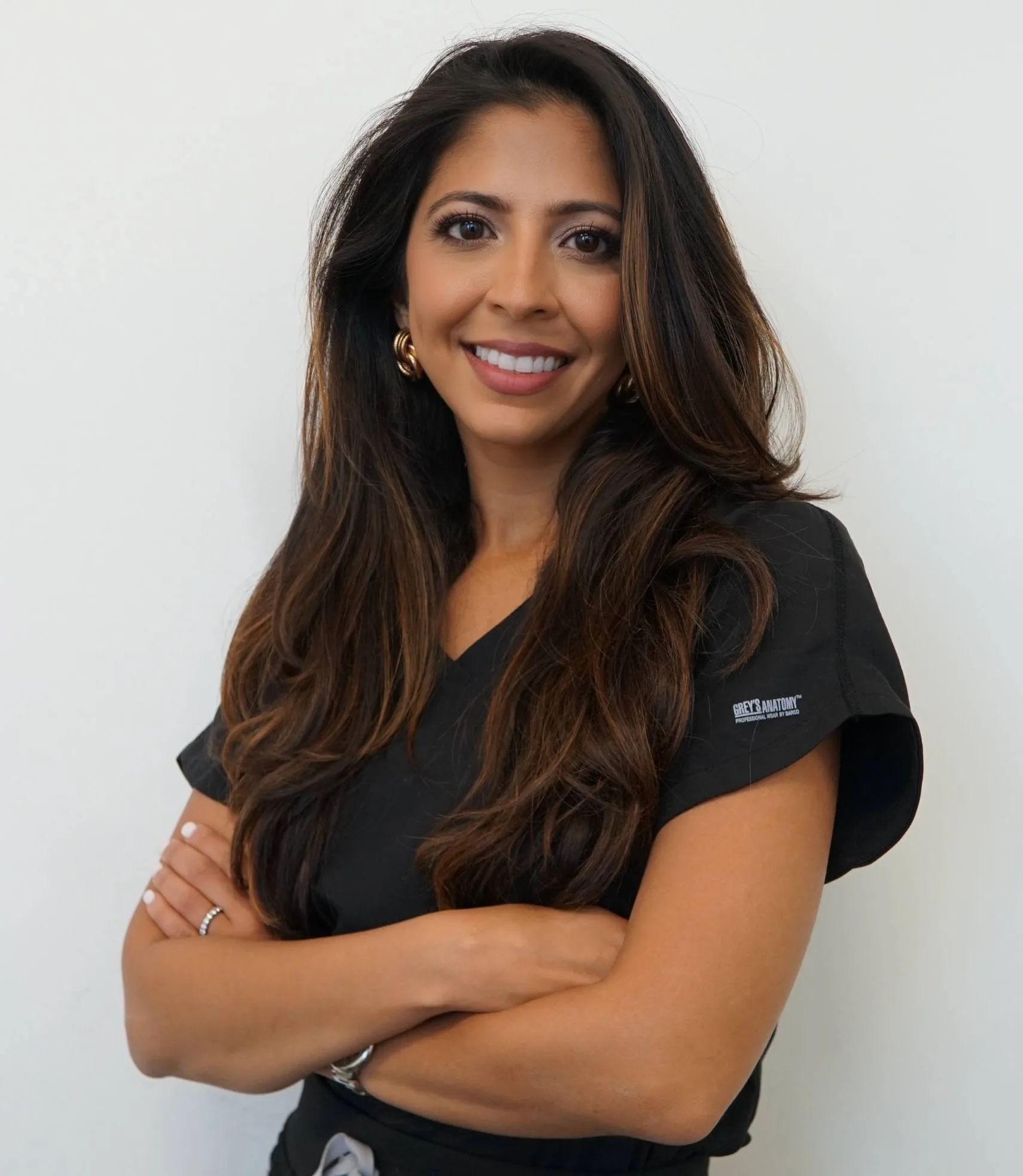 Resham Uttamchandani, MD
