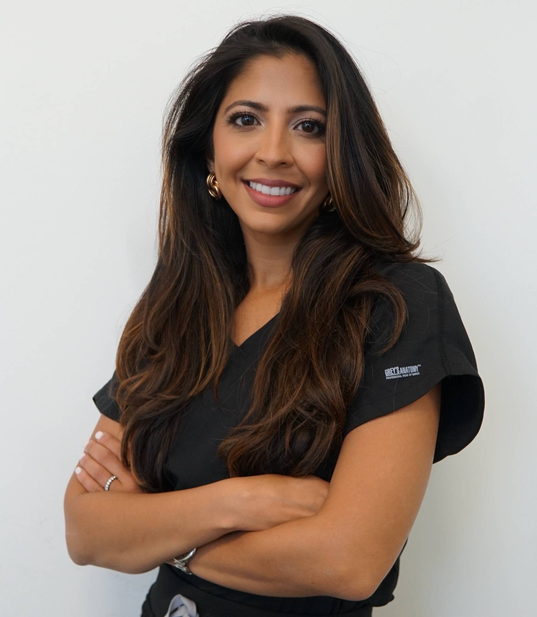 Resham Uttamchandani, MD